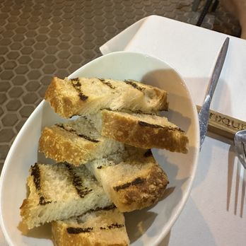 Ivantxu - Charcoal bread served with the cured wagyu - Signature Cuisine Near Me - Seville, SE