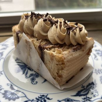 Baked Dessert Cafe and Gallery - Pumpkin cake with chocolate and butterscotch mousses and chai buttercream - Bakeries Near Me - Berlin, Maryland
