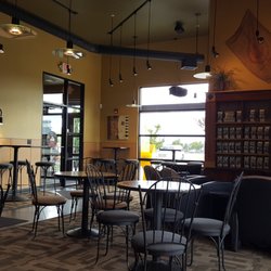 City Brew - Interior of the coffee shop. Nice seating, good selection of snacks, coffee and tea. Oh, and a friendly staff!