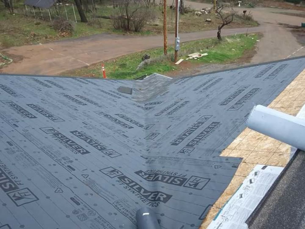 Slide of Mackney Roofing