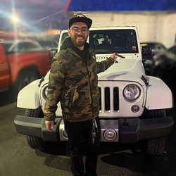 Connection Auto Sales - BEYOND excited; happy; pleased. Standing with my new JEEP WRANGLER SAHARAH UNLIMITED.