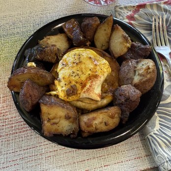Blue Heron Bistro - Leftovers of a burnt end pork belly Benedict & potatoes!  The original presentation was much nicer & larger! - Seafood Near Me - Coos Bay, Oregon