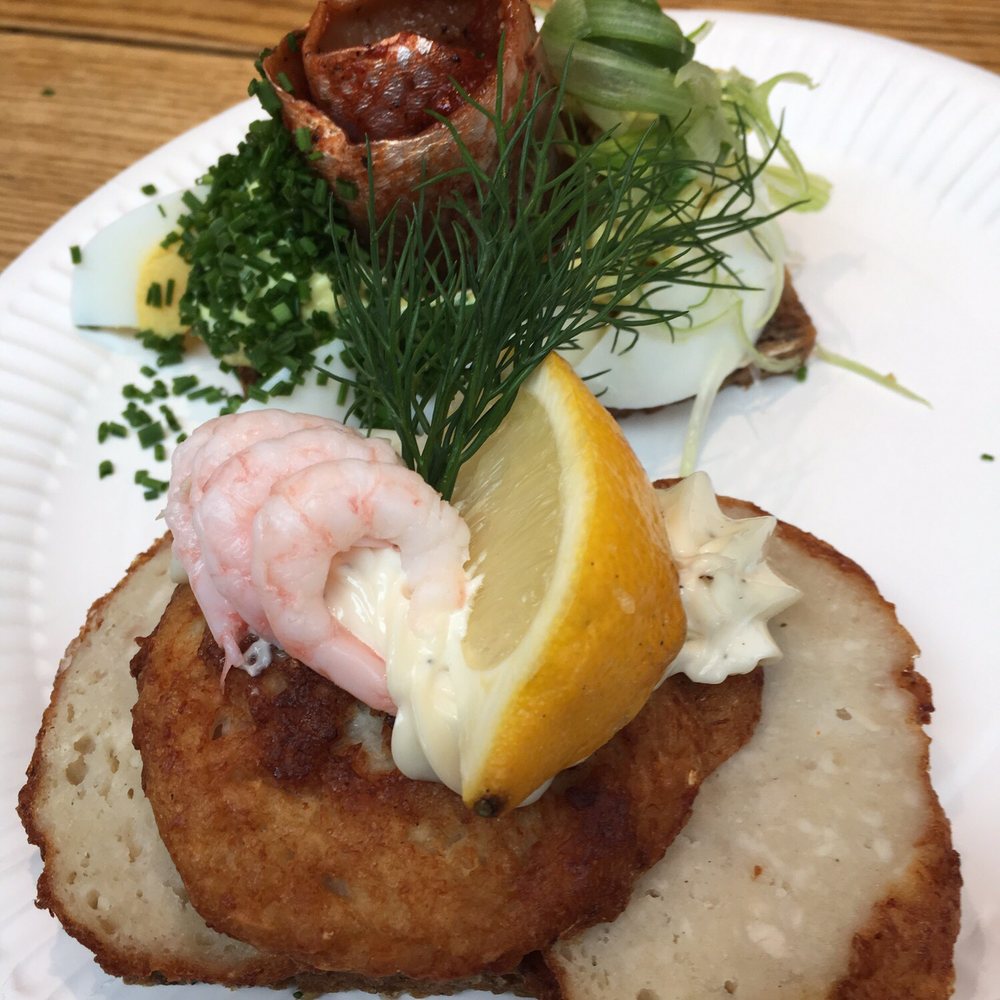 Fish cake with shrimp and herring smorrebrod Fish cake with shrimp and herring smorrebrod