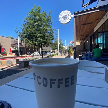 Houndstooth Coffee - Oat milk latte on the patio - Coffee & Tea Near Me - Austin, Texas