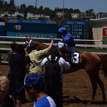 Del Mar Racetrack - Trainer Andy Mathis (great guy!) congratulates jockey Rafael Bejarano on bringing in Olympic Blue for the win. Opening Day 2015 - Race Tracks Near Me - Del Mar, California Del Mar Racetrack - Trainer Andy Mathis (great guy!) congratulates jockey Rafael Bejarano on bringing in Olympic Blue for the win. Opening Day 2015 - Race Tracks Near Me - Del Mar, California