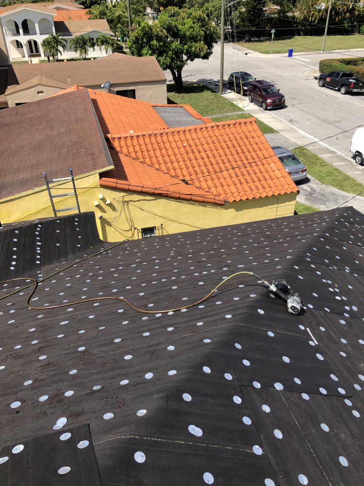 Slide of Kevin Mark Roofing