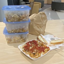 garbage plates in the airport ready to go home to Florida for sharing!