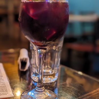Estrella Negra - a purple drink in a glass - Mexican Near Me - Chicago, Illinois Estrella Negra - a purple drink in a glass - Mexican Near Me - Chicago, Illinois