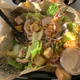 a salad in a tray