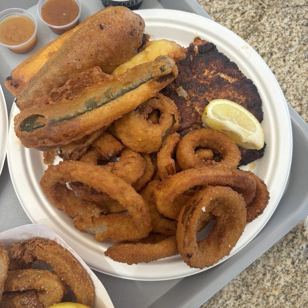 Sea Fresh Channel Islands - Blackened Seabass with onion rings and fried zucchini - Seafood Near Me - Oxnard, California Sea Fresh Channel Islands - Blackened Seabass with onion rings and fried zucchini - Seafood Near Me - Oxnard, California
