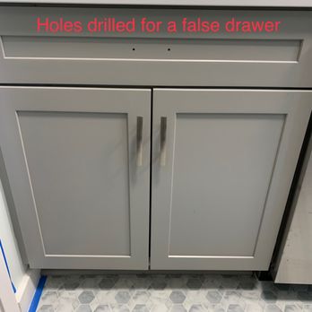 Lowe's Home Improvement - Holes drilled of a false drawer - Hardware Stores Near Me - Plainville, Connecticut