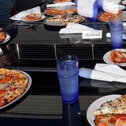 Pizza on the outdoor patio Pizza on the outdoor patio