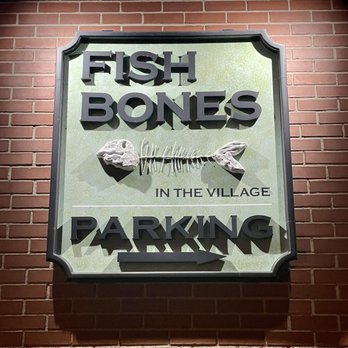 Fishbones - a sign on a brick wall - Seafood Near Me - Chelmsford, Massachusetts Fishbones - a sign on a brick wall - Seafood Near Me - Chelmsford, Massachusetts