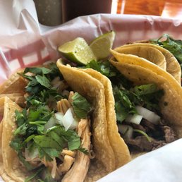 Chicken, steak, and chorizo tacos