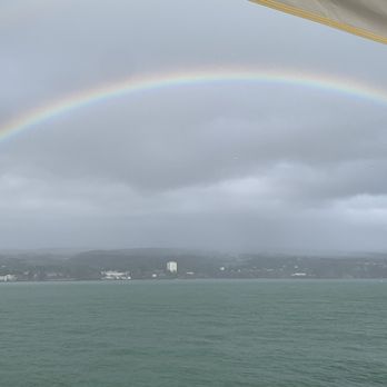 Malama Charters - Rainbow over Hilo harbor - Boat Charters Near Me - Hilo, Hawaii Malama Charters - Rainbow over Hilo harbor - Boat Charters Near Me - Hilo, Hawaii