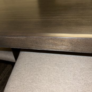 Ashley Store - Another side of the table scratched/lacks wood stain - Furniture Stores Near Me - Buford, Georgia