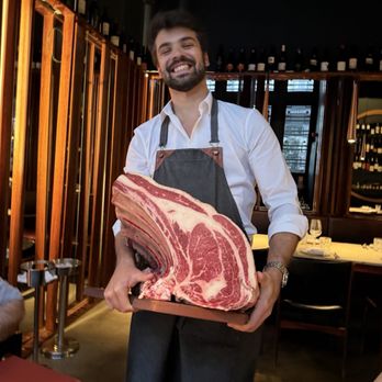 KOB by Olivier - Our waiter presenting one of the meat cuts where they hand, carve your steaks prior to  cooking - Steakhouses Near Me - Lisbon, 11