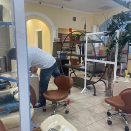 Calming nail salon with relaxing music playing overhead. Calming nail salon with relaxing music playing overhead.