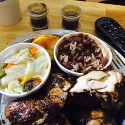 Half white jerk chicken with cabbage and red beans and rice!