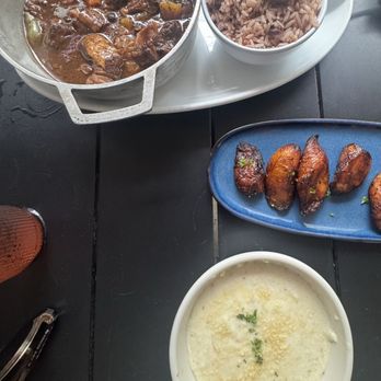 Dukunoo - Ox tail , rice and peas , plantains and grits - Caribbean Near Me - Miami, Florida Dukunoo - Ox tail , rice and peas , plantains and grits - Caribbean Near Me - Miami, Florida