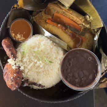 Buen Provecho - chicken tamale was yummy but I think since the black beans are warm they shouldn't be in a plastic container but overall yummy!! - Latin American Near Me - Albuquerque, New Mexico