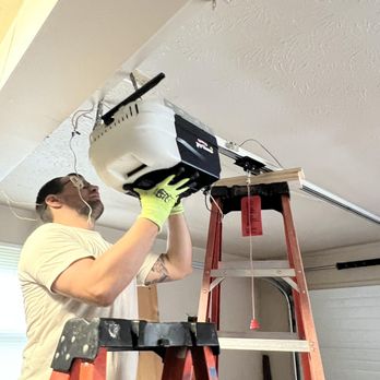 Rhododendron Electric - removing this old garage door opener to replace it with a smart garage door opener. - Electricians Near Me - Washington, West Virginia Rhododendron Electric - removing this old garage door opener to replace it with a smart garage door opener. - Electricians Near Me - Washington, West Virginia