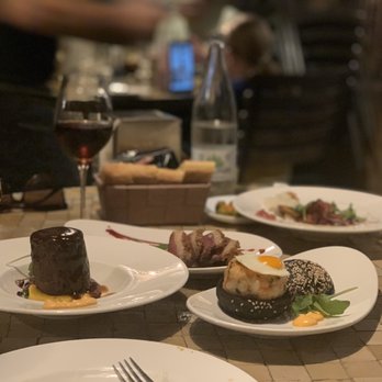 Al Aljibe - Arepita Oxtail, Duck Breast, and Shrimp Burger - Spanish Near Me - Seville, SE