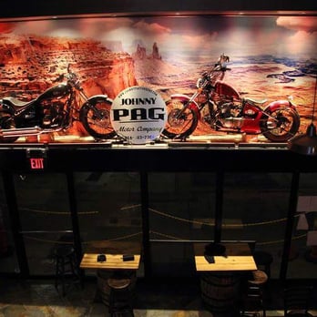 Whiskey Lounge - two motorcycles on display in a bar - Gastropubs Near Me - White Plains, New York Whiskey Lounge - two motorcycles on display in a bar - Gastropubs Near Me - White Plains, New York
