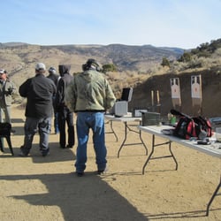 Semper Firearms Training - John providing instructions as we prepare to demonstrate our competence with firearms.