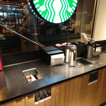 Starbucks - Overflowing trash and milk spilled on counter - Coffee & Tea Near Me - New York, New York Starbucks - Overflowing trash and milk spilled on counter - Coffee & Tea Near Me - New York, New York