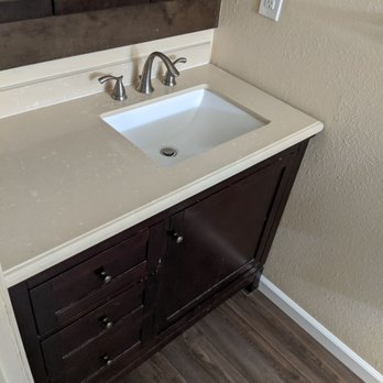 Kay Construction - Kay took out this vanity, replaced the floor underneath and fit everything back into place. - General Contractors Near Me Kay Construction - Kay took out this vanity, replaced the floor underneath and fit everything back into place. - General Contractors Near Me
