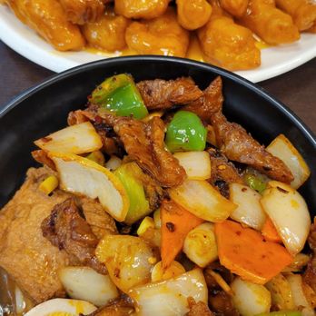 四姐 Special Noodle - Pork Intestine Mixed (Udon) Noodle (front) and Sweet and Sour Chicken (back). - Chinese Near Me - Richmond, California 四姐 Special Noodle - Pork Intestine Mixed (Udon) Noodle (front) and Sweet and Sour Chicken (back). - Chinese Near Me - Richmond, California