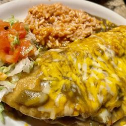 Smiling Faces - Stuffed Sopaipilla with shredded chicken, spicy and green chili.
