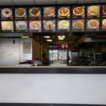 Number One Chinese - a restaurant counter with menus on the wall - Chinese Near Me - Matawan, New Jersey