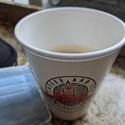 Cortado in a to go cup Cortado in a to go cup