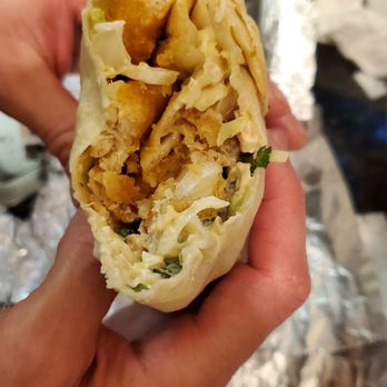 Blue Coast Burrito - Baja Fish Burrito. So good! Lots of battered fish! - Mexican Near Me - Nashville, Tennessee Blue Coast Burrito - Baja Fish Burrito. So good! Lots of battered fish! - Mexican Near Me - Nashville, Tennessee