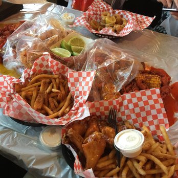 Red Claws Crab Shack - Mango Habanero Wings Basket, Fried Calamari, and 6 Lbs of Crawfish. - Cajun/Creole Near Me - Arlington, Texas Red Claws Crab Shack - Mango Habanero Wings Basket, Fried Calamari, and 6 Lbs of Crawfish. - Cajun/Creole Near Me - Arlington, Texas