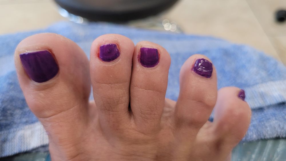 Sky Nails & Spa Logo