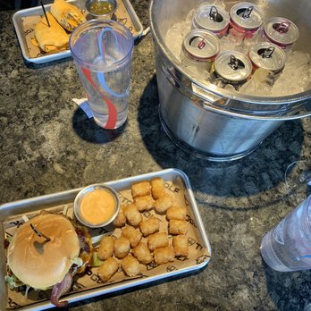 Topgolf - Smokehouse bbq burger with tatter tots. The breakfast burrito. A bucket of 6 seltzers. - Golf Near Me - Fishers, Indiana Topgolf - Smokehouse bbq burger with tatter tots. The breakfast burrito. A bucket of 6 seltzers. - Golf Near Me - Fishers, Indiana