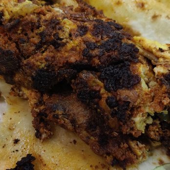 Poliberto's Taco Shop - Disgusting choriza burrito. Purina makes higher quality food - Mexican Near Me - Tempe, Arizona