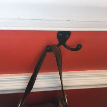 Savorez - Hook for hanging stuff along the wall near the high top tables - Latin American Near Me - Wilmington, North Carolina Savorez - Hook for hanging stuff along the wall near the high top tables - Latin American Near Me - Wilmington, North Carolina