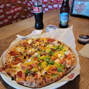 MOD Pizza - a large pizza on a plate - Fast Food Near Me - Woodland, California MOD Pizza - a large pizza on a plate - Fast Food Near Me - Woodland, California