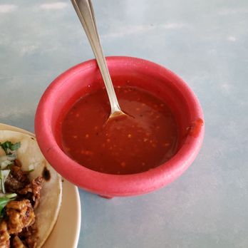 Tacos & Ranchitos - a bowl of chili sauce and a taco - Breakfast & Brunch Near Me - Denver, Colorado Tacos & Ranchitos - a bowl of chili sauce and a taco - Breakfast & Brunch Near Me - Denver, Colorado