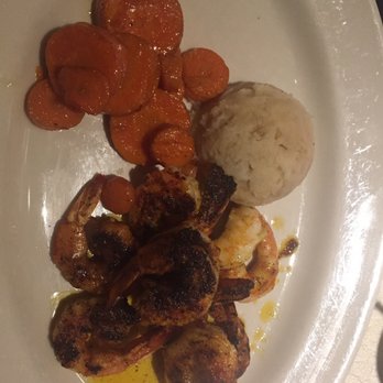 French Quarter Grille - Blackened Gulf shrimp with mashed potatoes and carrots. Delicious. - American Near Me - Austin, Texas