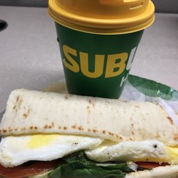 Steak and eggs breakfast sammich + coffee for the bargain price of $4.93 (tax included!)