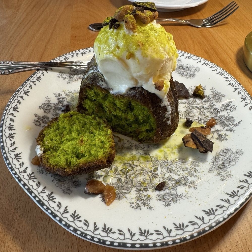 Flora - Pistachio olive oil cake. Really delicious and not overly sweet. - New American Near Me - Charlotte, North Carolina