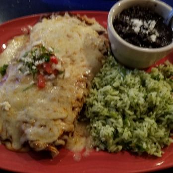 Caliente - The enchilladas were pretty good and the sauce complemented the cilantro rice pretty well. - Tex-Mex Near Me - Houston, Texas Caliente - The enchilladas were pretty good and the sauce complemented the cilantro rice pretty well. - Tex-Mex Near Me - Houston, Texas