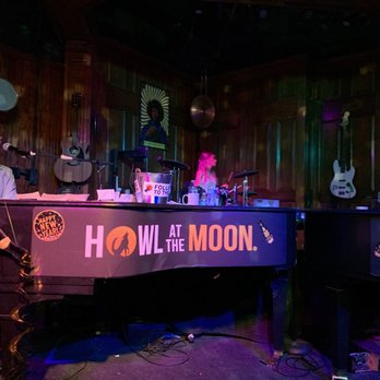 Howl at the Moon Indianapolis - a man sitting at a piano - Bars Near Me - Indianapolis, Indiana Howl at the Moon Indianapolis - a man sitting at a piano - Bars Near Me - Indianapolis, Indiana