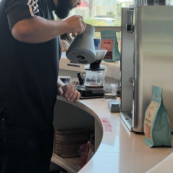 Here & There - Pour over in progress - Coffee & Tea Near Me - Stanton, California Here & There - Pour over in progress - Coffee & Tea Near Me - Stanton, California