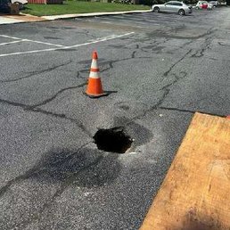 Picture of sink hole take almost 2 months ago. Hole is still present and has gotten larger Picture of sink hole take almost 2 months ago. Hole is still present and has gotten larger